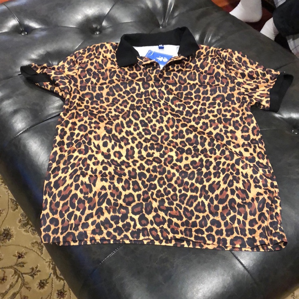Mens NEW with tags.. “cheetah” golf shirt
